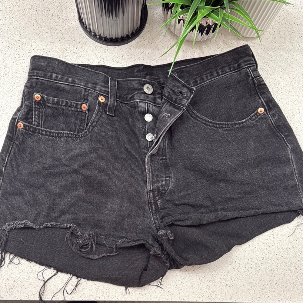 Levi’s 501 Distressed Black Denim Shorts
